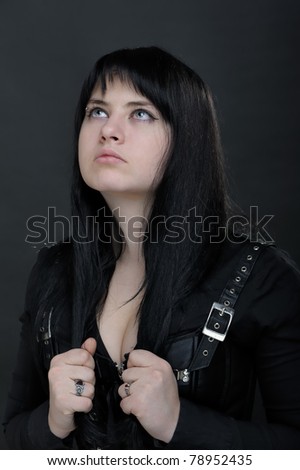 Dark woman on black background