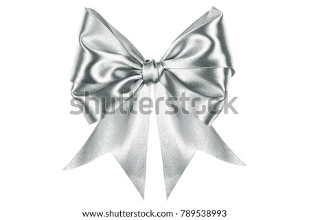 Shiny silver satin ribbon bow on white background