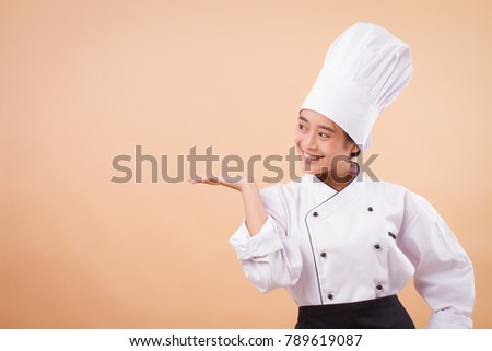 woman chef pointing hand to the side way