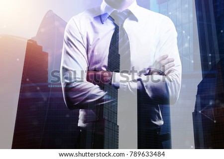 Unrecognizable businessman with folded arms standing on abstract city backgr5ound with polygonal pattern. Future and employment concept. Double exposure 