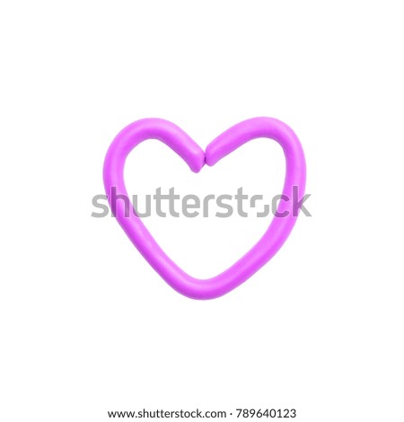 Closeup plasticine for kid in heart shape isolated on white background with clipping path