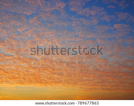 Beautiful  fluffy white clouds floating in the blue sky , Twilight sky background with Colorful sky in twilight background