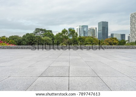 empty pavement and modern buildings in city
 Royalty-Free Stock Photo #789747613