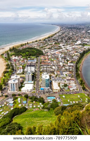 Wide shot view of coast town Mount Maunganui and Tauranga Harbour, Bay of Plenty, New Zealand