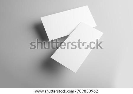 Real photo, business card mockup template, front and back, isolated on light grey background to place your design. 
