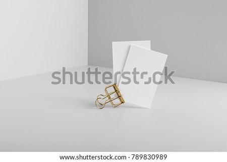 Real photo, business card mockup template, isolated on light grey background to place your design. 