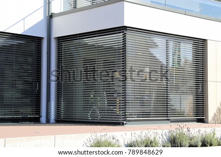 Window with modern blind, exterior shot Royalty-Free Stock Photo #789848629