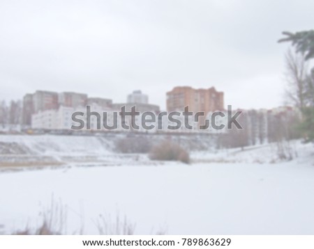
White blur abstract background from nature park with cityscape high buildings block of flats in the early sping