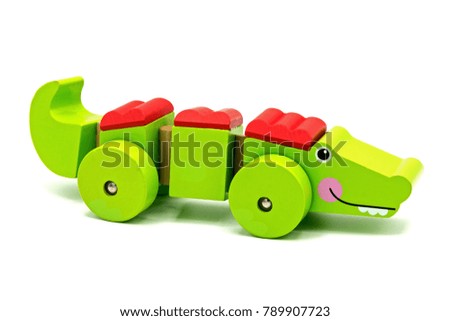 Wooden toy isolated on white background