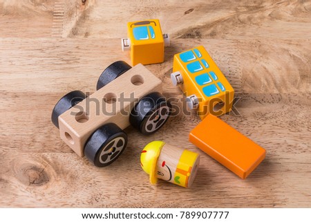 Wood toy puzzle toy car on wooden table