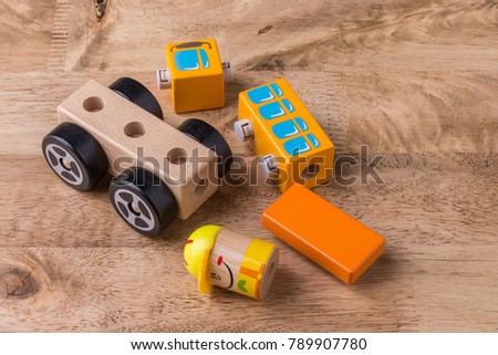 Wood toy puzzle toy car on wooden table