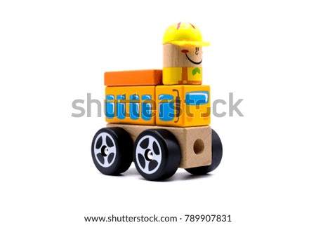 Wooden puzzle car toy isolated on white background