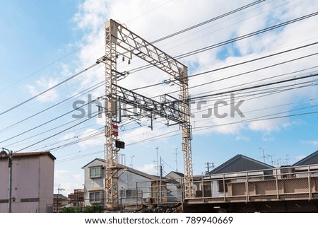 The railway power cables on local train railway track in Japan.