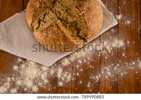 Traditional Irish Soda Bread Made For St. Patrick's Day Served On Floured Wooden Table