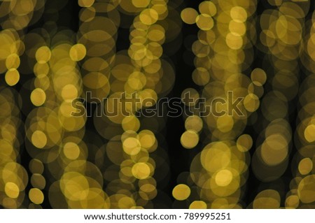 Bokeh of yellow lanterns that adorn the tree. For background use at various festivals.