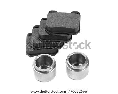 Brake pads and pistons. Isolate on white background