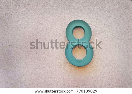number 8 house number on the wall eight