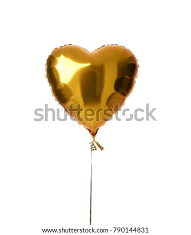Single big gold heart metallic balloon for birthday party isolated on a white background