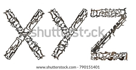 Alphabet low case letters `x, y, z` assembled from metallic parts