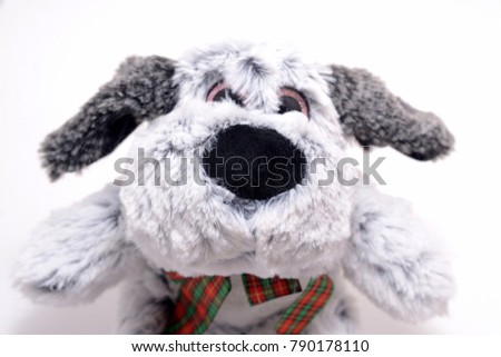 gray dog doll isolated on white