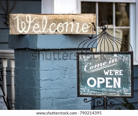 Welcome, Come in we're open, Open sign, welcome sign, entrance to shop