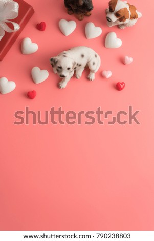 Flat view of valentines hearts with dog and decoration on pink background with copy space. Symbol of love. Happy Valentines Day background.Saint Valentine's Day concept.
