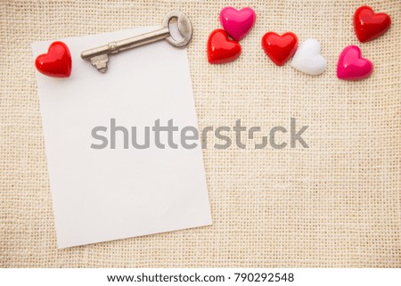 Abstract valentine 's day, Red Heart with paper on white fabric linen texture for graphic design or add text message. Love concept.