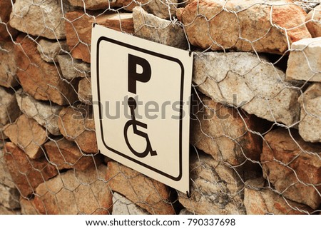 Disabled parking road sign. Wheelchair accessibility concept image. 