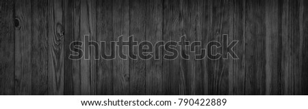 black wooden planks, a panorama of the wood texture with natural patterns