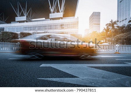 cars driving on inner city road of shenzhen, china