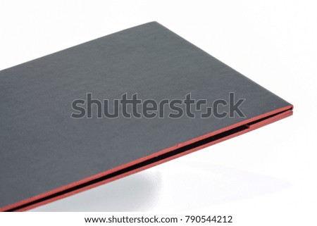 Black leatherette with Red border