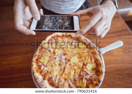 hipster take a food photo before eating,Social media addiction.