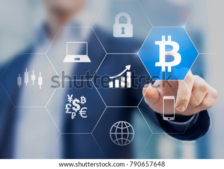 Businessman making successful financial investment in Bitcoin cryptocurrency trading with high ROI, concept with person touching BTC currency symbol on virtual screen Royalty-Free Stock Photo #790657648