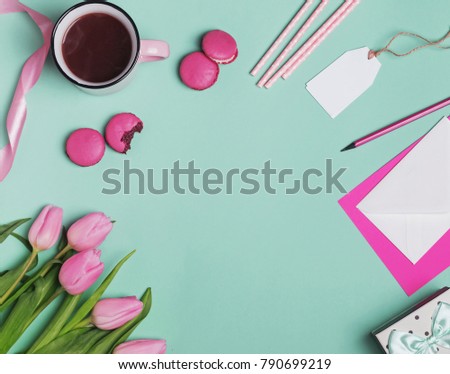 Spring styled desktop on the mint color background.
