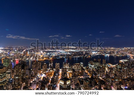 New York City skyline aerial panorama view at night, Times Square and skyscrapers of midtown Manhattan.