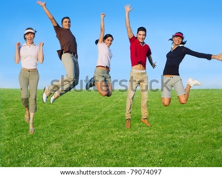 Jumping young people happy group in meadow blue sky outdoor [Photo Illustration]