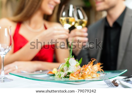 Couple for romantic Dinner or lunch in a gourmet restaurant Royalty-Free Stock Photo #79079242