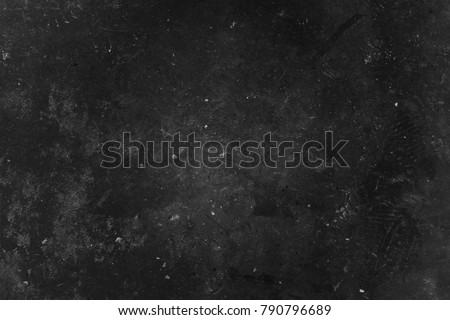 Old black grunge background. Concrete wall. Dark textured wallpaper. Grunge image. Film grain Royalty-Free Stock Photo #790796689