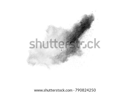 Black powder explosion. The particles of charcoal splatter on white background. Closeup of black dust particles splash isolated on  background.