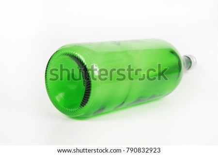 Glass empty bottle with screw cap.
