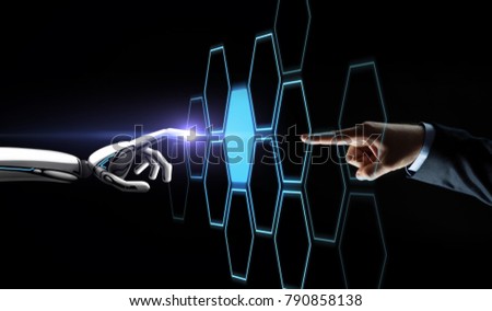 future technology, artificial intelligence and business concept - robot and human hand touching virtual network hologram over black background