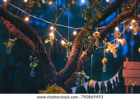 Green wooden yellow flowers photo zone with rustic decorations 