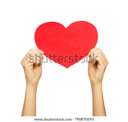adult famale hand holding paper heart, isolated on white.