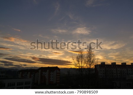 Sunrise and sunset over the buildings in the city. Slovakia	
