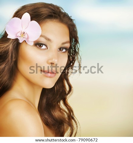 Beautiful Summer Woman on the Beach