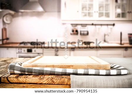 Table background of kitchen and free space for your product. 