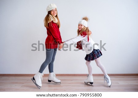 Girls on ice skates