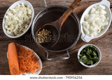 Cooking soup. Wooden background