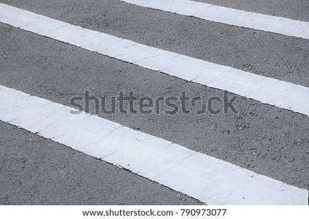 Street line larking made from white color thermoplastic material. 