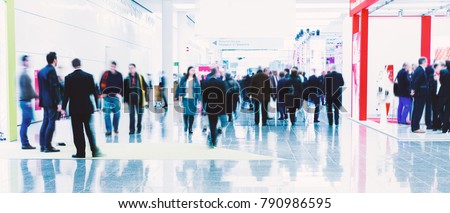 business people crowd at an expo concept